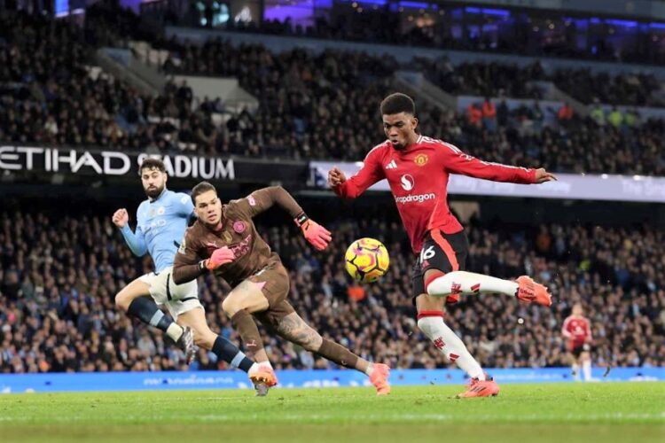 Amad Diallo (à d.) marque le but de la victoire face à Manchester City